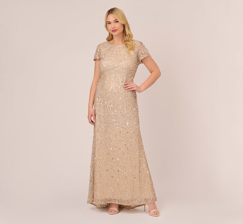 Plus Size Scoop Back Sequin Gown In Champagne