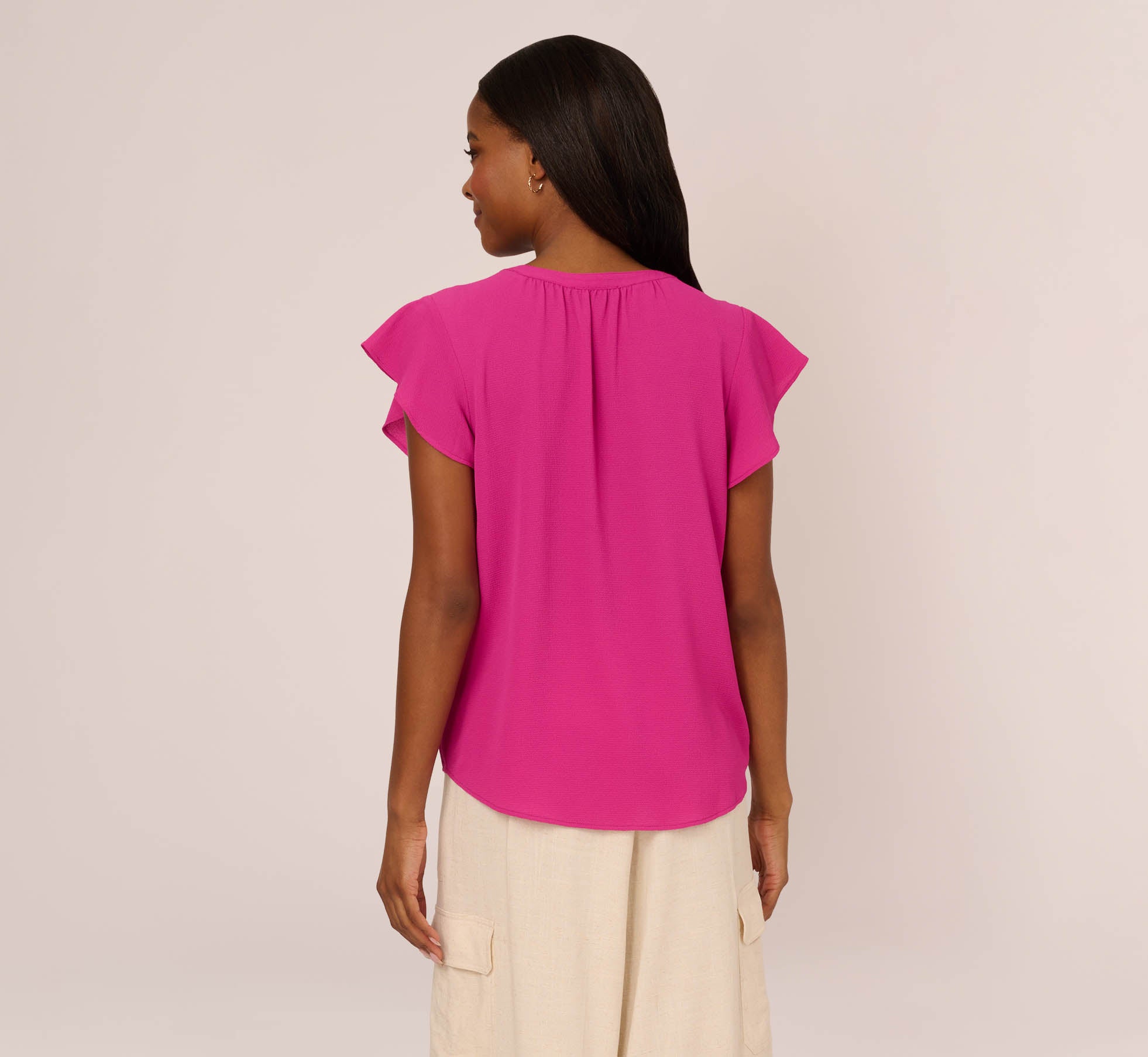 Ruffle Short Sleeve Top With V Neckline In Tropical Fuchsia 