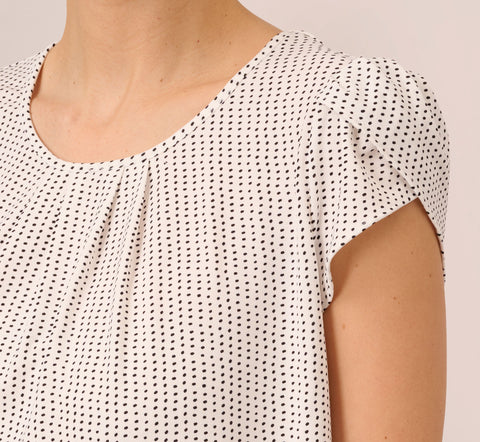 Short Sleeve Printed Top With Pleated Details In Ivory Black Seed Dot