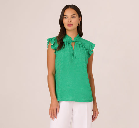 Printed Flutter Sleeve Top With Tie Neck In Emerald Ivory Micro Dot