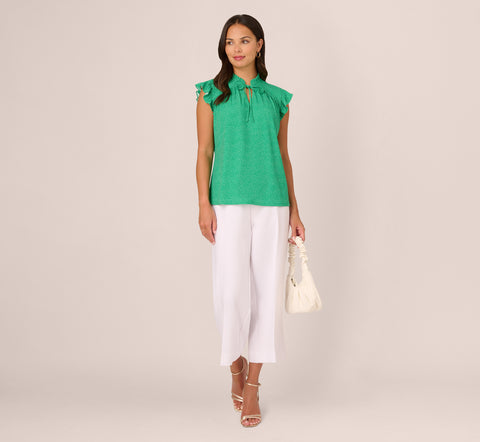 Printed Flutter Sleeve Top With Tie Neck In Emerald Ivory Micro Dot