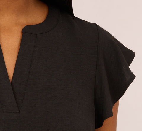 Flutter Sleeve Top With Notched Neck In Black