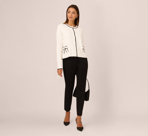 Crew Neck Tipped Bow Pocket Cardigan Sweater In Ivory Black