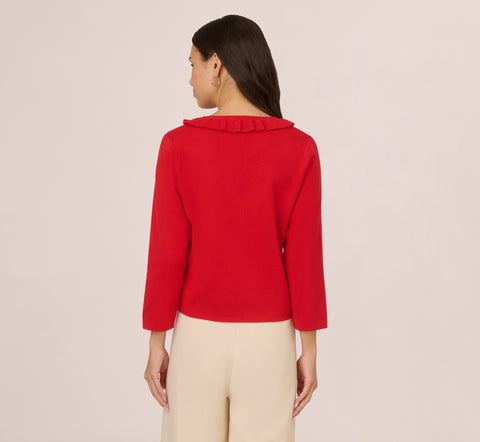 Pearl Button Ruffle Pullover In Red Lava