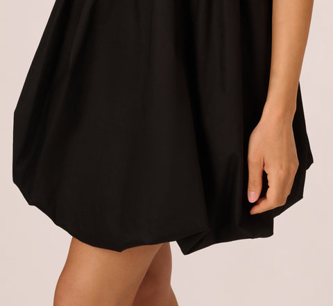 Short Bubble Dress With Bow Tie Straps In Black