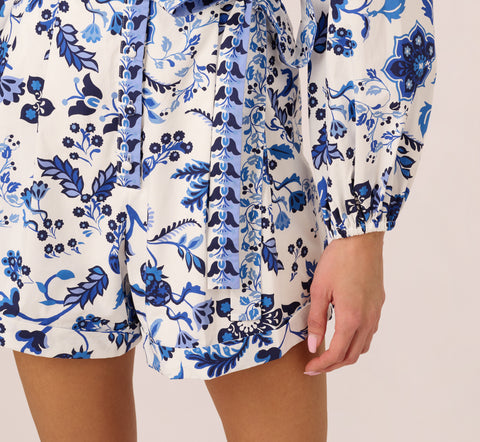 Long Sleeve Tie Front Floral Romper In White Blue Multi