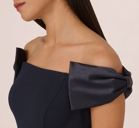 Off The Shoulder Crepe Column Gown With Bow Accents In Twilight