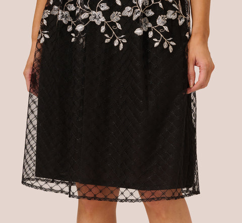 Floral Embroidered Midi Dress With Sheer Cap Sleeves In Black Ivory