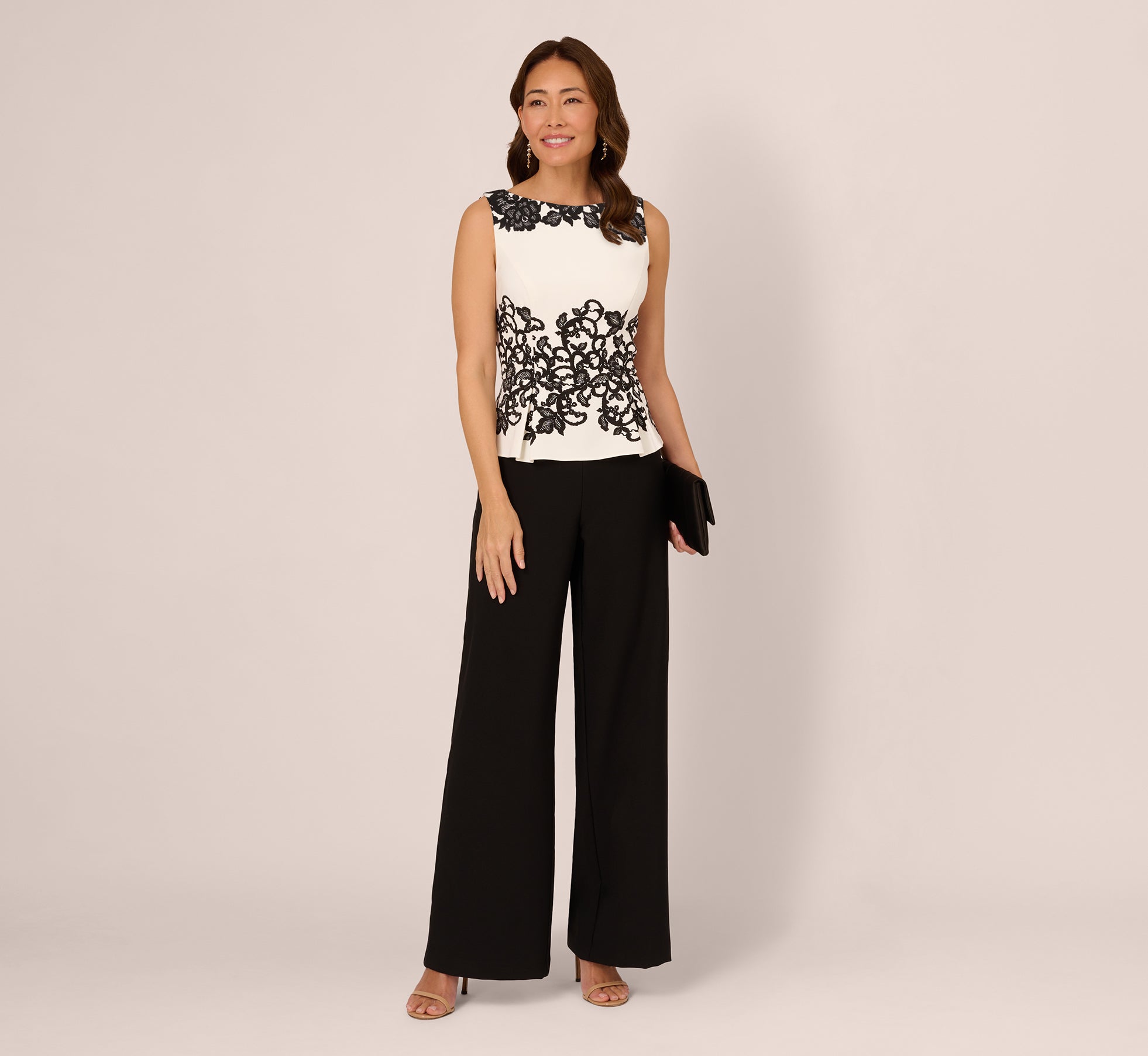 Sleeveless Peplum Jumpsuit With Scroll Lace Details In Ivory Black