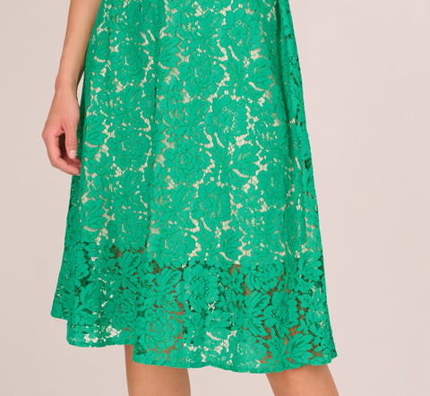 Sleeveless Lace Fit And Flare Dress With Sheer Details In Botanic Green