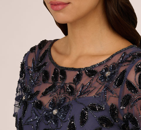 Hand Beaded Short Sleeve Floral Godet Gown In Smoky Peri