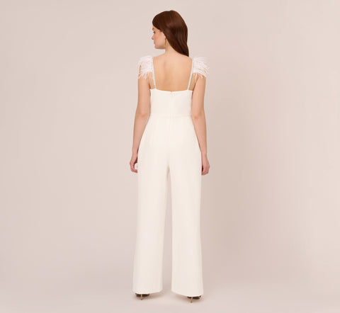 Crepe Wide Leg Jumpsuit With Bead And Feather Accents In Ivory