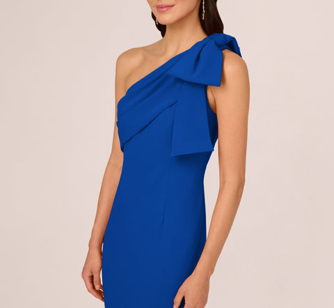 Stretch Crepe One Shoulder Mermaid Gown With Bow Accent In Violet Cobalt