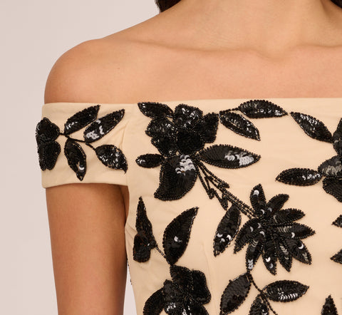 Off The Shoulder Column Gown With Leaf Beading In Black Nude