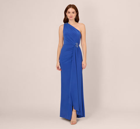 One Shoulder Draped Jersey Gown With Floral Sequin Accents In Brilliant Sapphire