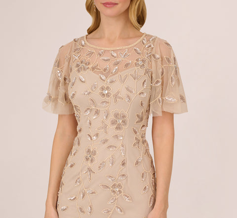 Floral Beaded Sheath Dress With Sheer Neck And Sleeves In Latte