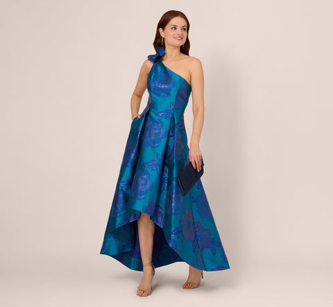 Floral Jacquard One Shoulder High Low Gown With Rosette Accent In Teal Blue