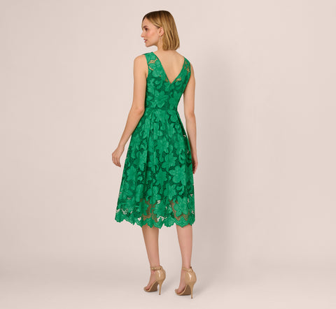 Lace Sleeveless Midi Dress With Sheer Neck And Hem In Green