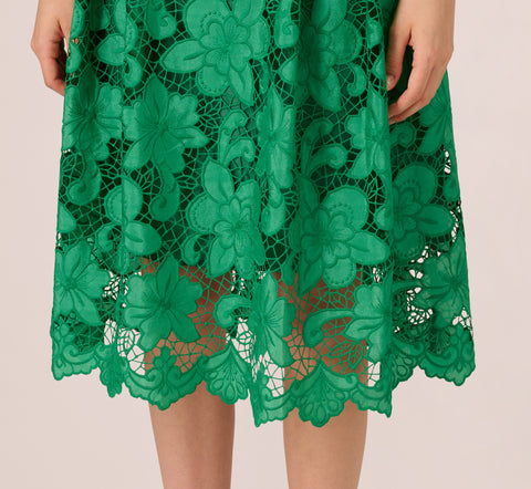 Lace Sleeveless Midi Dress With Sheer Neck And Hem In Green