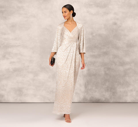 Pleated Foiled Long Column Dress With Slit And Flutter Sleeves In Silver Gold